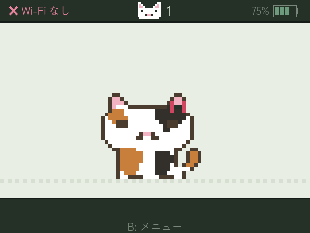 耳に赤いリボンをつけた三毛猫